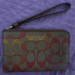 Coach Signature Pattern Wristlet in Red and Orange